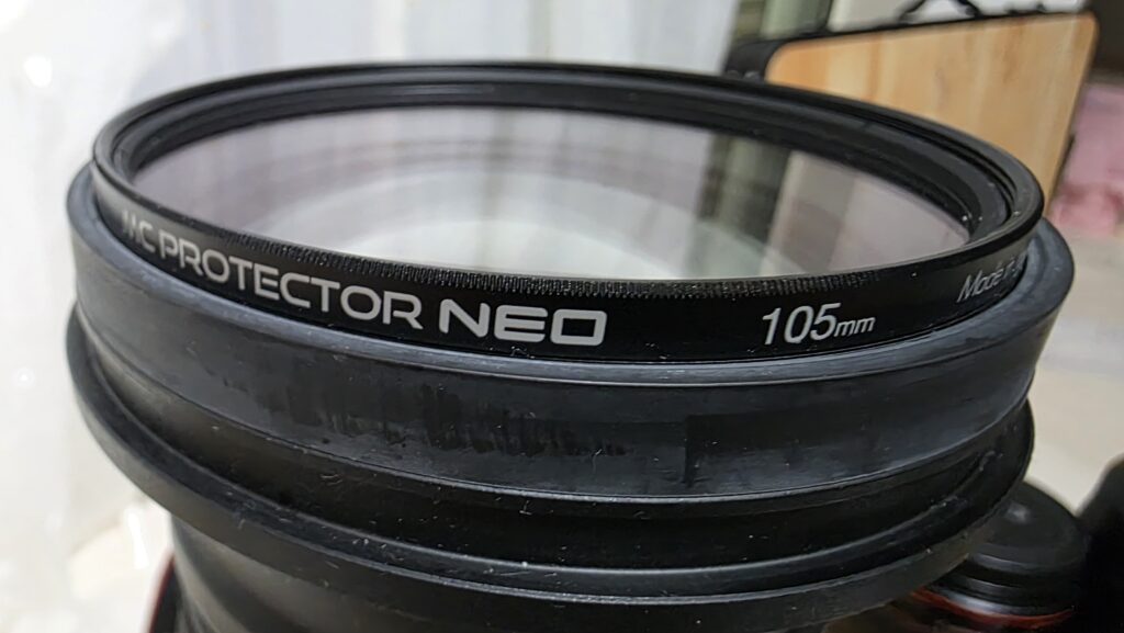 超望遠ズームレンズ｜SIGMA SPORTS 60-600mm F4.5-6.3 DG OS HSMにレンズ保護フィルター｜Kenko 105mm MCプロテクター プロフェッショナル NEOを装着した状態の写真